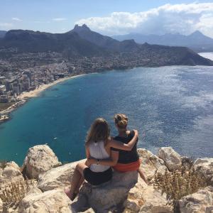 On a day trip from Valencia, Carthage students sit atop Calpe Rock along Spain?s eastern coast.